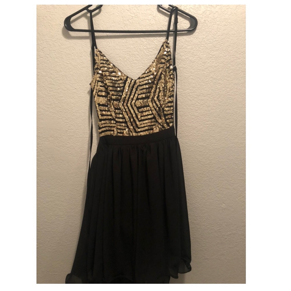 Black and gold backless cocktail dress